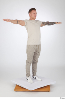Gilbert beige t-shirt beige trousers casual dressed standing t-pose white…